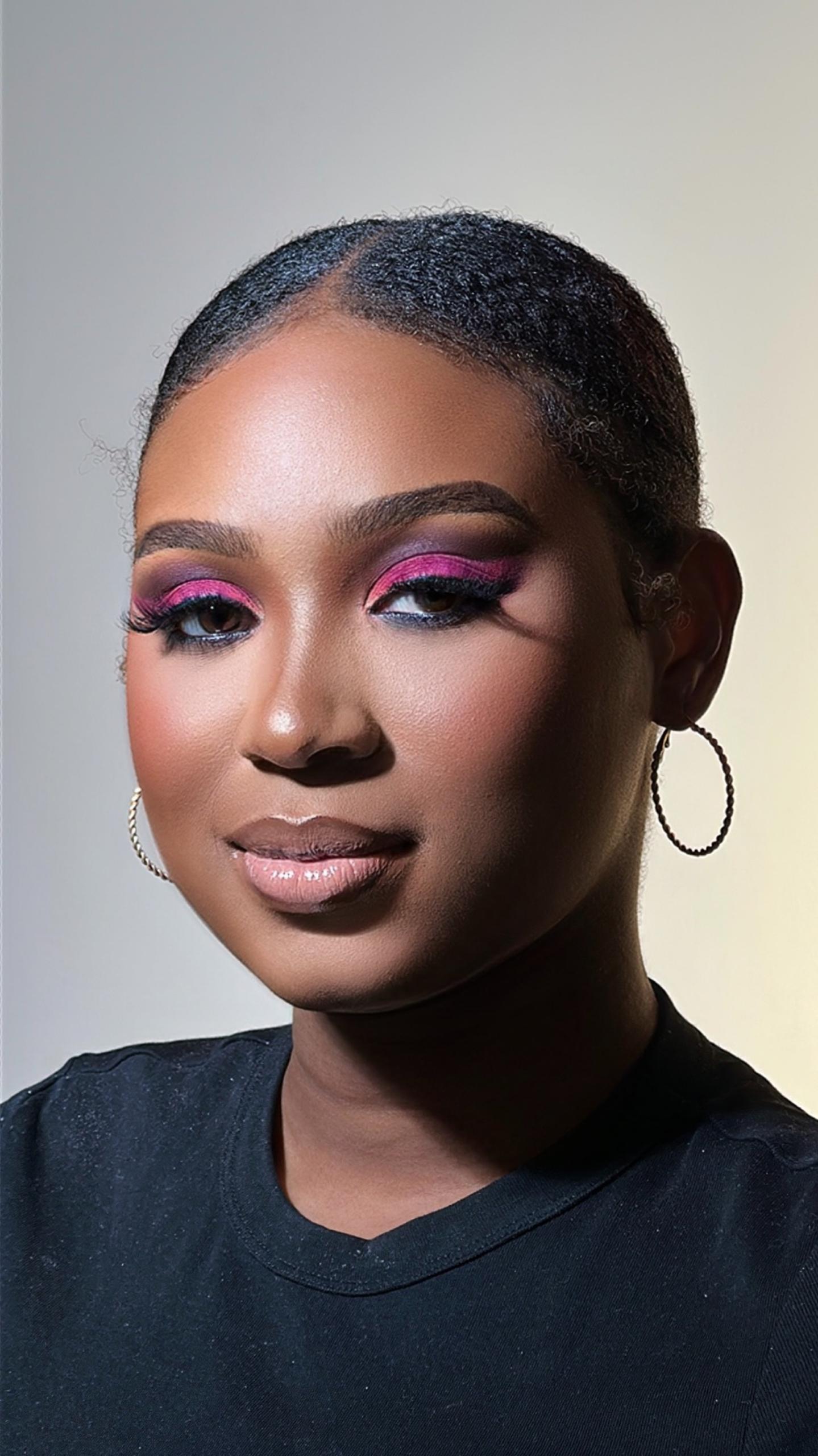 Bold pink cut-crease eye makeup
